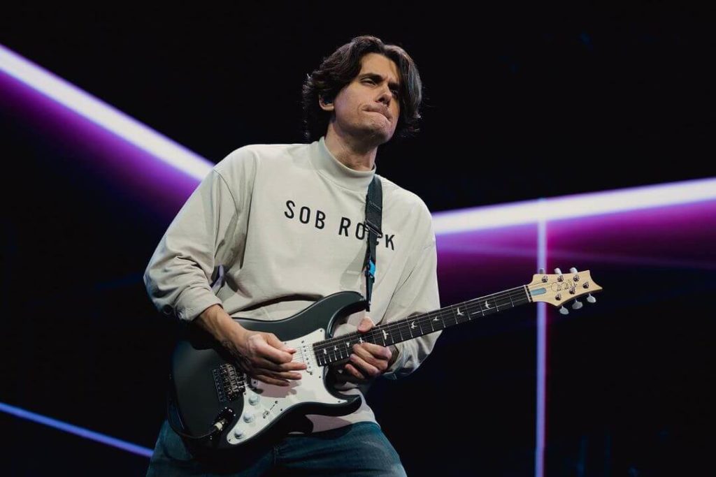 John Mayer Wears Fear Of God ‘Sob Rock Tour’ Merch During Performance